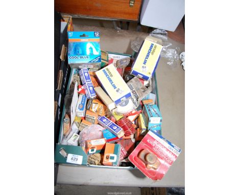 A box of vehicle light bulbs, bicycle inner tubes etc.