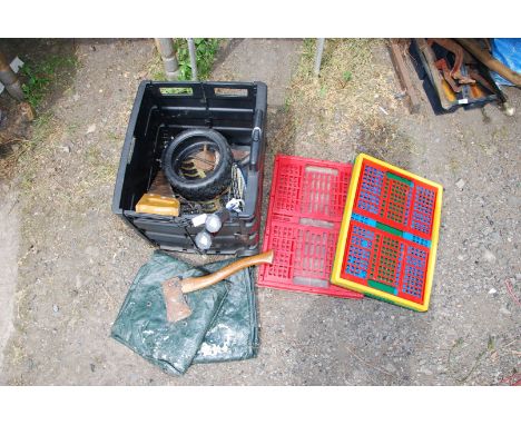 A small axe, hand saws. lawn mower tyre 85/65, badminton racquets etc