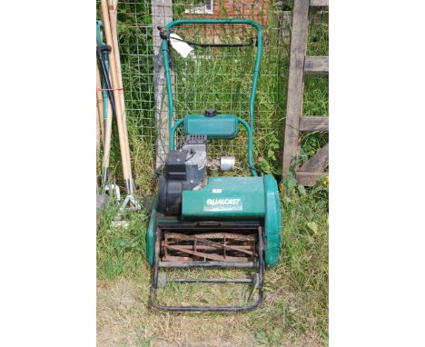 A Qualcast cylinder mower, no grass box, engine turns.