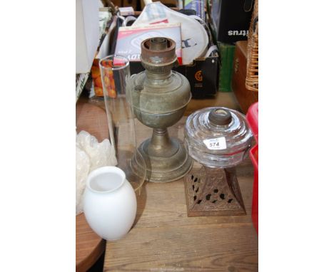 Two oil lamp base plus a shade etc.