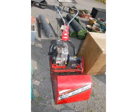 A Rover 45 Reel cylinder mower with grass box, good compression at time of lotting, with manual (in office)