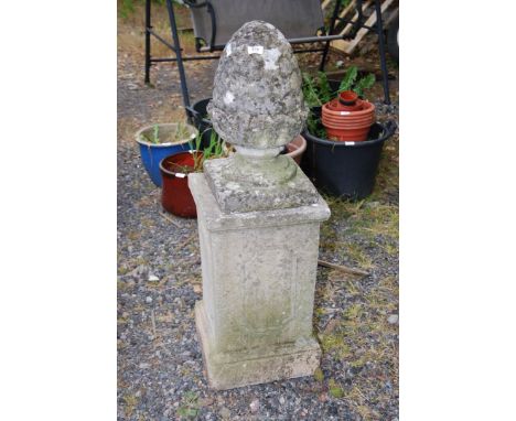 A concrete pillar with pineapple finial, 41 1/2" high (in two sections).