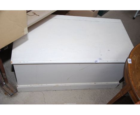 A white painted wooden trunk, 39" x 20" x 19" high.
