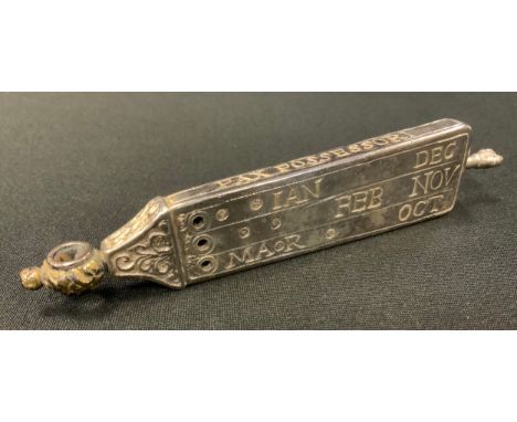 An Antiquary's white metal pocket sundial, after the Anglo-Saxon discovered in the cloister of Canterbury Cathedral, 11.5cm l