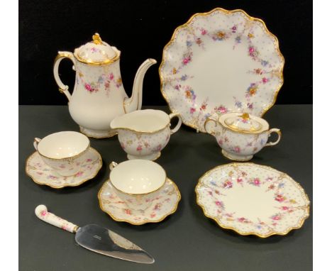 A Royal Crown Derby Royal Antoniette pattern coffee pot, sucrier and milk jug;  similar graduated wavy edge plates, two cups 