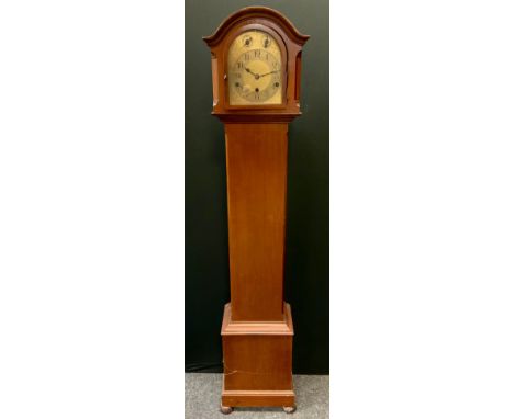 An early 20th century mahogany cased longcase clock of small proportions, musical chime movement, triple winding holes, brass