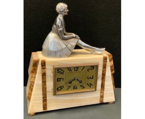 A French Art Deco figural mantle clock, white onyx and marble canted rectangular case with chromed Seated Dancing Girl  surmo