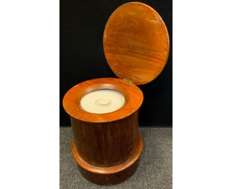 A 19th century mahogany cylinder commode, needle work top, with bucket, 47cm high, 42cm diameter 