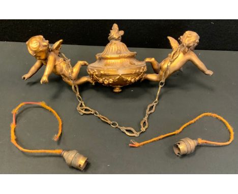 A 19th century French gilt metal two branch light fitting, central urnular section the two branches as winged cherubs arms ou