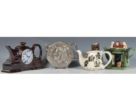 A group of four Cardew collectors teapots to include mantel clock teapot, a Victorian fireplace teapot, a 50 pence coin teapo