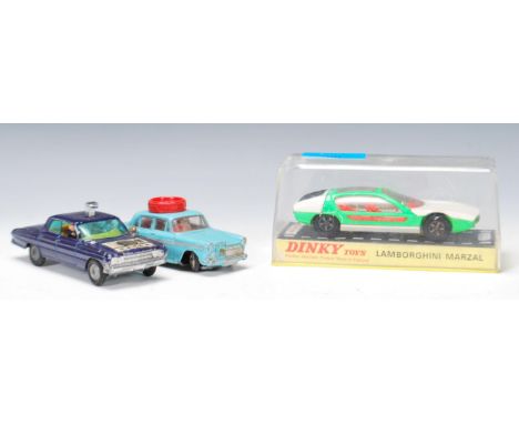 Three vintage 20th Century diecast model toy cars to include a Corgi Oldsmobile super 88 Man From U.N.C.L.E, Corgi Austin A.6