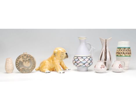 A small group of retro 20th Century mix ceramic wares to include multiple vase of varying sizes and designs, a pair of matchi
