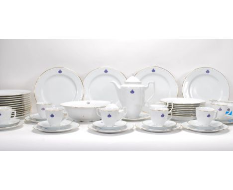 A large German Graf Von Henneberg Regina Katherina pattern tea and dinner service having a white ground with gilt rims and ra