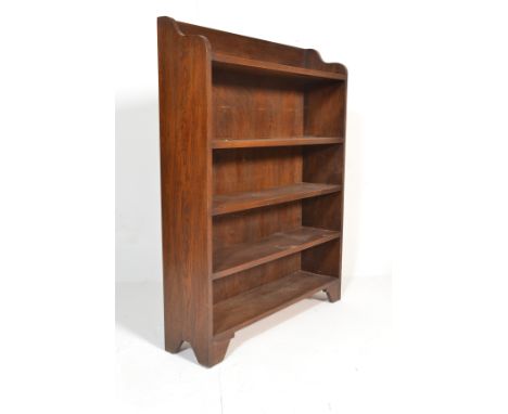 A good quality early 20th century Arts &amp; Crafts solid oak open window large bookcase. Shaped sides with gallery top shelf