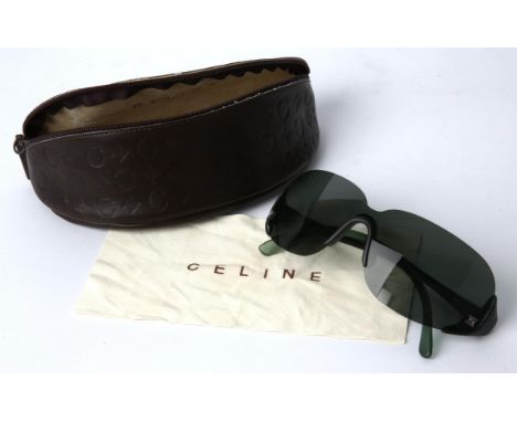 CELINE A pair of unisex dark green sunglasses in soft CELINE case.Condition Report:  Good condition