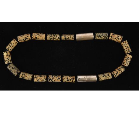 Costume jewellery. A Dalmatian jasper tubular necklace with receipt RRP £270  Condition Report:  Good condition