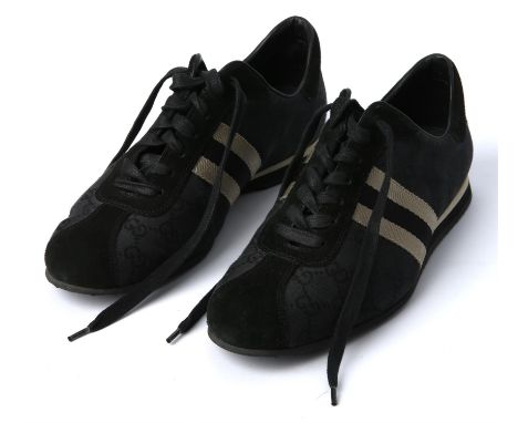 GUCCI A pair of black canvas trainers UK size 6Condition Report:  Good condition with light wear to soles