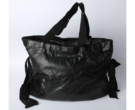 JUICY COUTURE A large black PVC shopping bag with grosgrain ribbon handles and silver coloured hardware . (Approx. measuremen