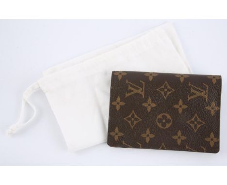 LOUIS VUITTON A monogram bi-fold Porte Cartes credit card holder with personalised initials "BJ" inside. (10cm x 14cm closed)