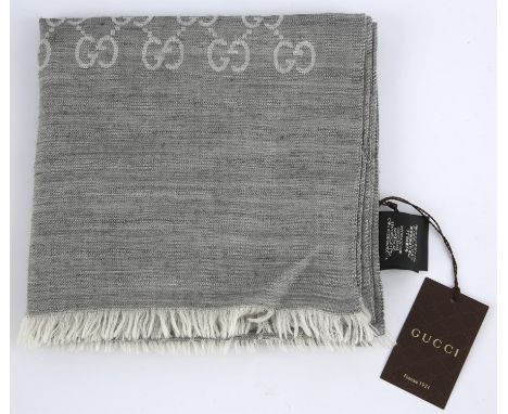 GUCCI unisex scarf 70% wool 30% silk. (45 x 180cm) in grey with original label. Condition Report:  Excellent condition 