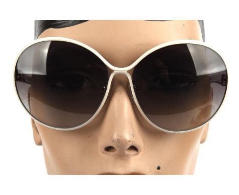 NINA RICCI a pair of ladies sunglasses in a black zipped caseCondition Report:  Good used condition