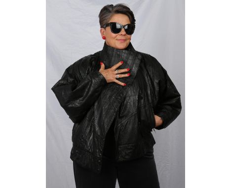 A 1980s ladies good quality French-made black leather jacket with batwing sleeves and detachable real MINK fur lining. Fits U