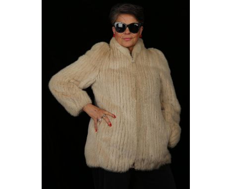 An excellent quality bespoke-made Canadian (D.H Grosvenor Furs Inc Quebec) MINK FUR blouson style jacket, ivory in colour wit