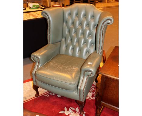 Chesterfield green leather button back wing back armchair
