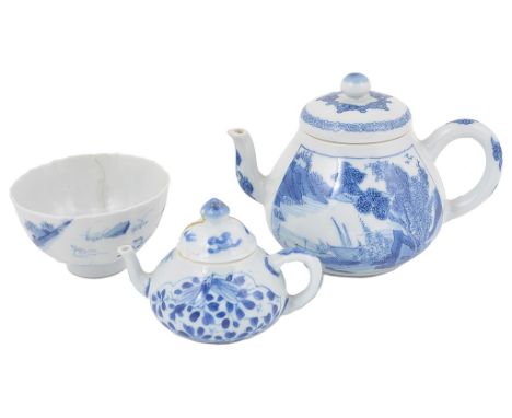 A collection of two Chinese blue and white teapots and a cup18th/19th centuryTo include: a small teapot decorated with two sc