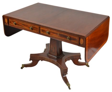 A  Sofa Table:George III mahogany, crossbanded in satinwood, with two drawers & two false drawers either side, on an octagona