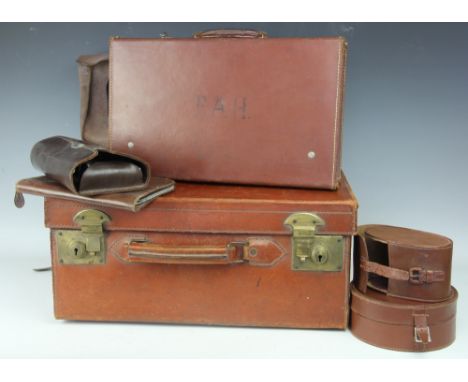 A collection of vintage leather goods, to include a tan leather suitcase, 49cm x 42cm, four satchels, a collars box etc (Qty)