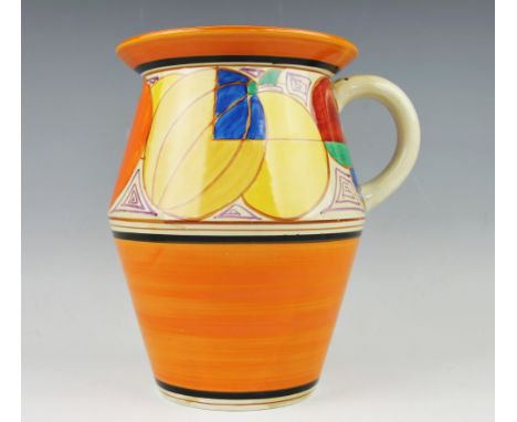 A Clarice Cliff Melon pattern Tolphin jug, circa 1930, painted with a deep band of geometric fruit above an orange and black 