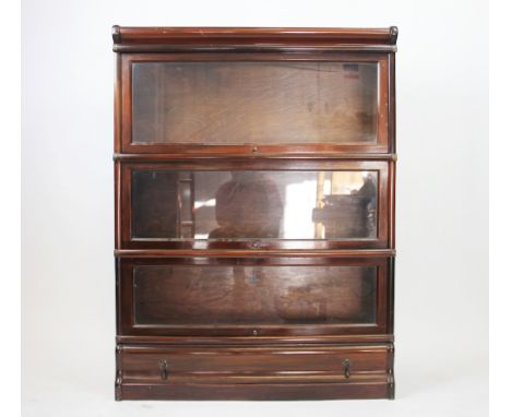 A mahogany three section Globe Wernike bookcase, 115cm H x 87cm W