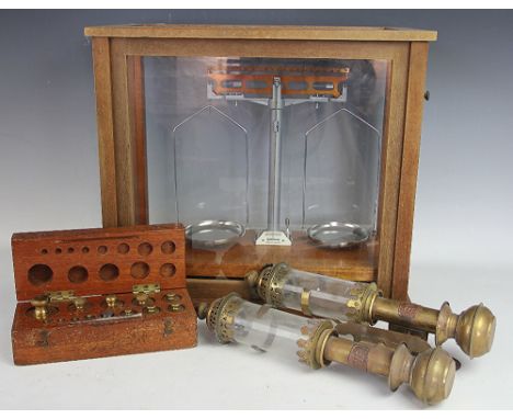 A case set of Gallenkamp micro scales, 40cm high, with a box of brass weights (one lacking) and a pair of GWR brass railway w