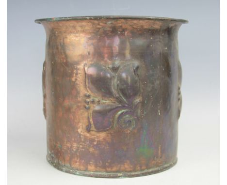 A Keswick School of Industrial Arts style copper jardiniere / bin, with four embossed foliate panels, 24cm H, with a copper c