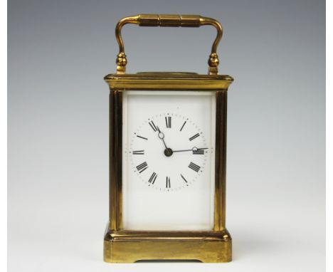A French lacquered brass carriage time piece, with enamel Roman numeral dial, 31cm