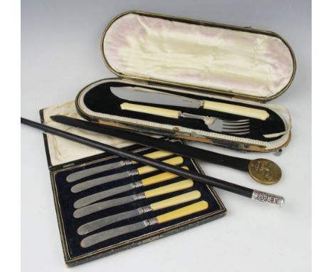 A pair of cased silver and ivory handled fish servers, Cooper Brothers & Sons Ltd, Sheffield 1925, each with ogee moulded ter