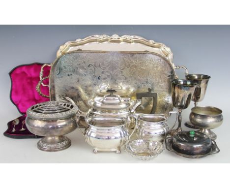 A collection of 19th century and later silver plated items, to include a three piece tea service, a shell and scroll salver, 