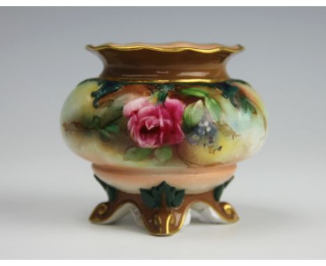 A Royal Worcester Hadley's squat vase, the body decorated with multiple blossoms and foliage including yellow and pink roses,