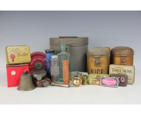 A selection of 19th century and later storage tins, a plate mounted glass hip flask, a door knocker, a treen gavel, glass bot