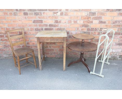 A vintage pine school desk, 77cm H x 60cm W x 50cm D, with a pine chapel chair, a two tier mahogany dumb waiter and a painted