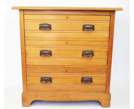 An Edwardian pine chest, on three graduated long drawers, on bracket feet, 84cm H x 84cm W x 52cm D
