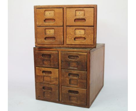 Two vintage golden oak storage chests, each of plain design, comprising a six drawer example and a four drawer example, large