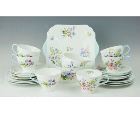 A Shelley Wild flower part tea service, comprising  six teacups, six saucers, six side plates, cream jug, sugar bowl and serv