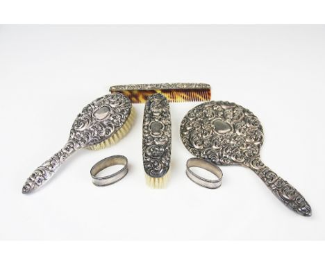 A German '800' standard silver four piece dressing table set, mirror, comb and two brushes, with a pair of '800' standard ova