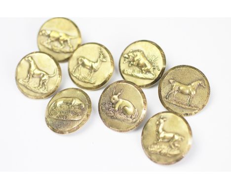 A set of eight Edwardian gilt metal hunting buttons, each embossed with a different animal, comprising; Hare, Horse, Doe and 