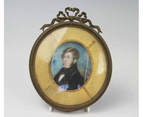 English School (early 19th century), Watercolour on ivory laid on paper, Portrait of a Young Gentleman, In gilt oval frame - 