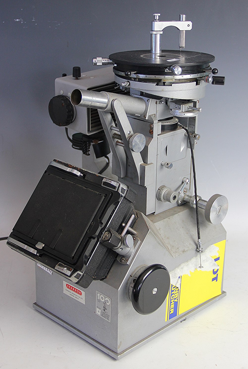 A Reichert Universal Camera Microscope MeF, No 261 651, with label for