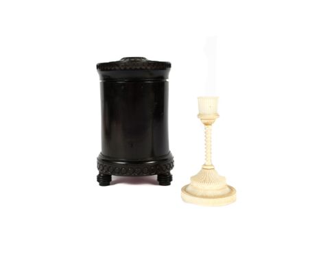 Ebony cylindrical box with ivory inset cover  India, circa 1900 the interior having a telescopic container, 16cm high and an 