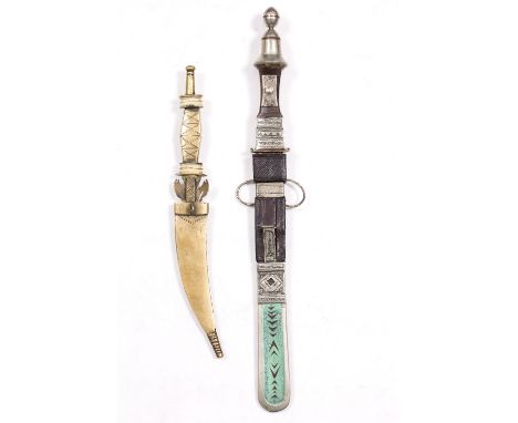 Tauraq dagger with leather, turquoise and silver metal handle and scabbard, 31cm and a smaller Tauraq dagger (2)